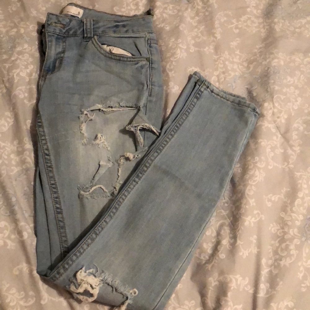 Super holy skinny jeans.